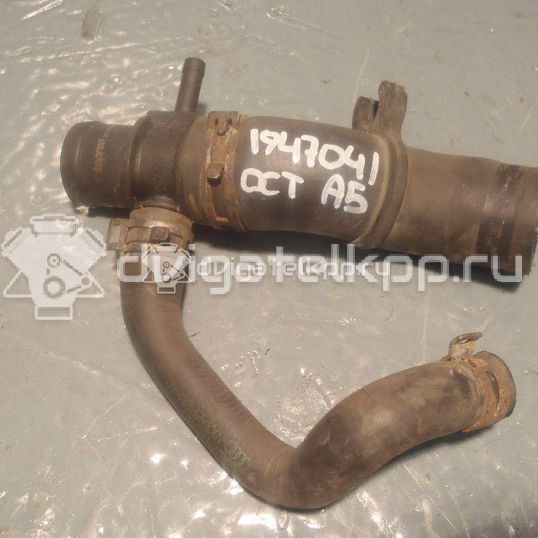 Фото Патрубок радиатора  1K0121101E для Skoda Octavia / Octaviaii 1Z3