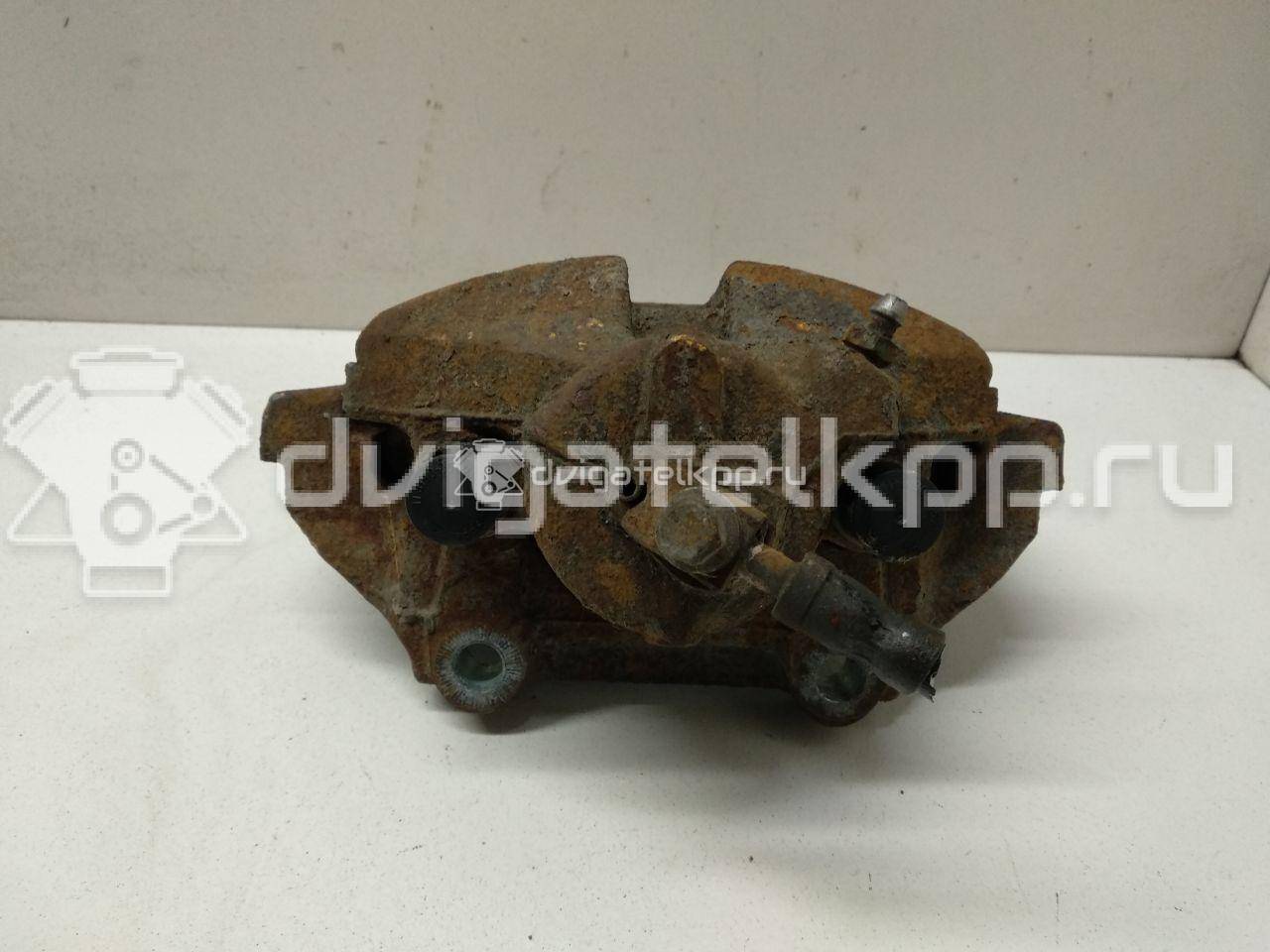 Фото Суппорт тормозной передний правый  1K0615124E для Skoda Roomster 5J / Octaviaii 1Z3 / Yeti 5L / Fabia / Octavia {forloop.counter}}