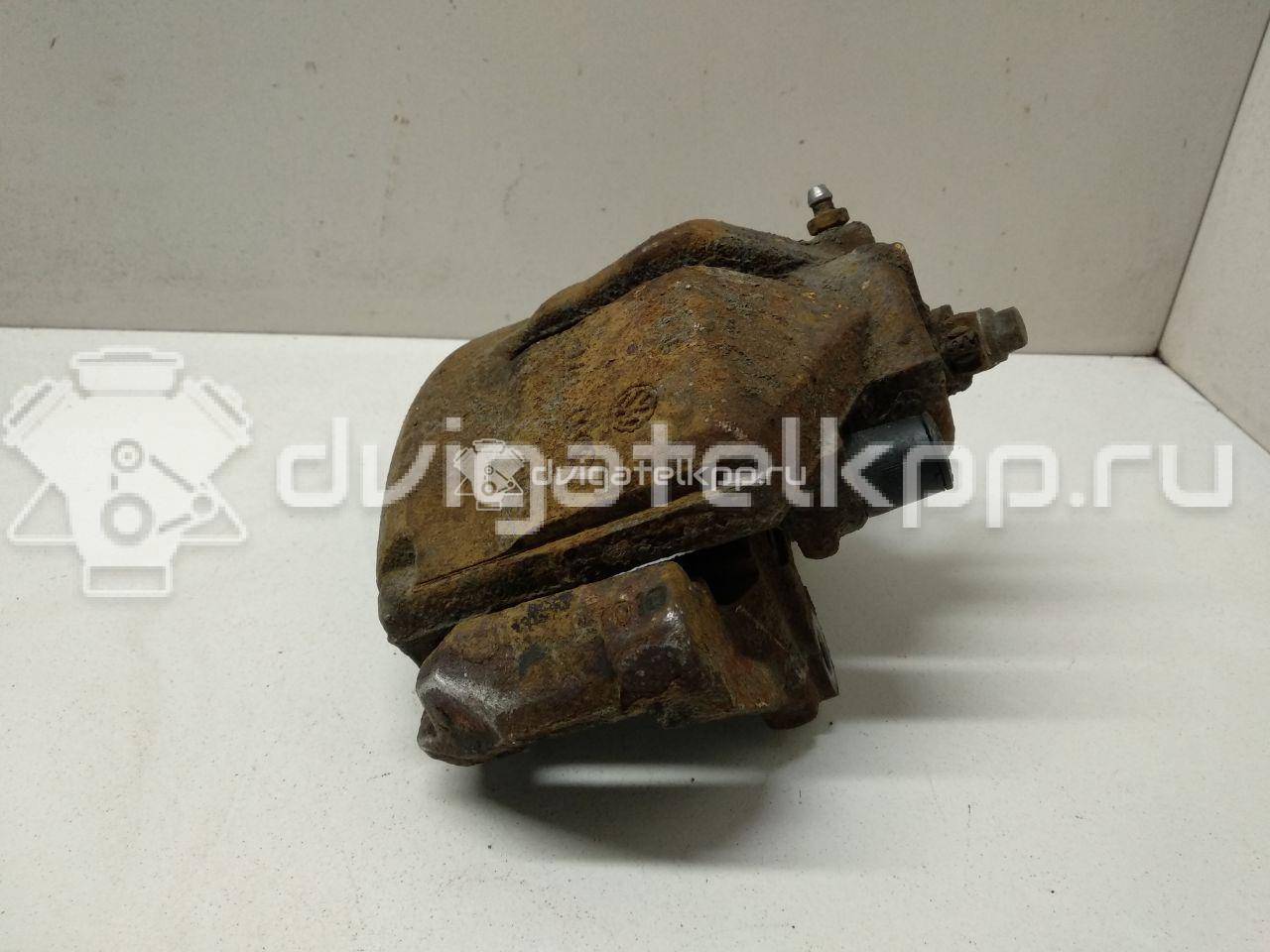 Фото Суппорт тормозной передний правый  1K0615124E для Skoda Roomster 5J / Octaviaii 1Z3 / Yeti 5L / Fabia / Octavia {forloop.counter}}