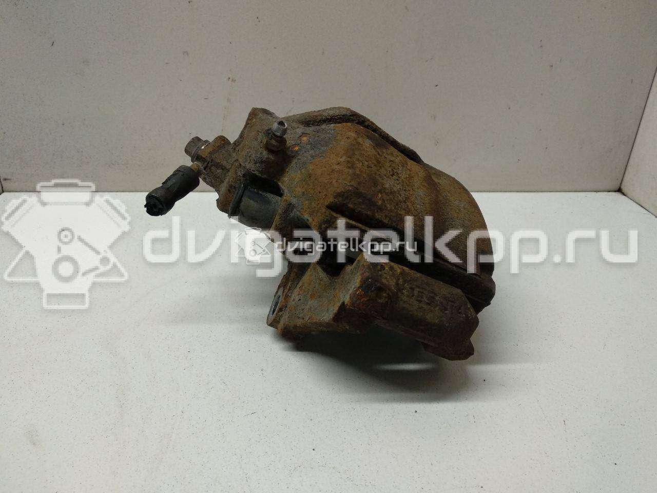 Фото Суппорт тормозной передний правый  1K0615124E для Skoda Roomster 5J / Octaviaii 1Z3 / Yeti 5L / Fabia / Octavia {forloop.counter}}