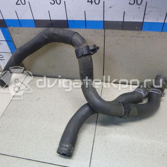 Фото Патрубок радиатора  5Q0121049AD для skoda Octavia (A7)