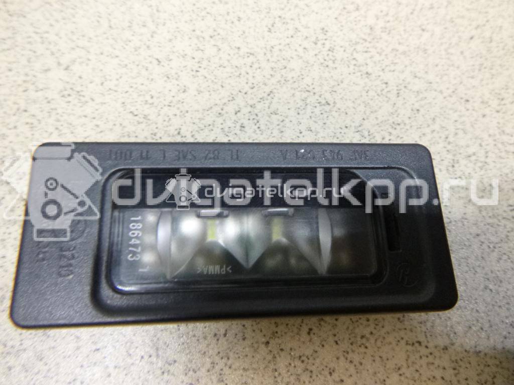 Фото Фонарь подсветки номера  3AF943021A для Skoda Yeti 5L / Fabia / Octavia / Superb / Rapid {forloop.counter}}