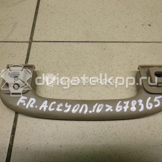 Фото Ручка внутренняя потолочная  7761034000EAW для ssang yong Actyon New/Korando C