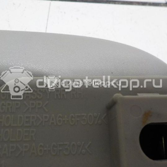 Фото Ручка внутренняя потолочная  7762034100EAW для ssang yong Actyon New/Korando C