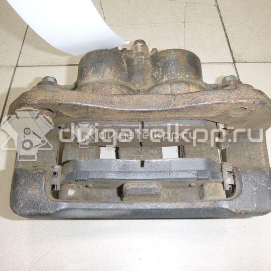 Фото Суппорт тормозной передний левый  4811034050 для ssang yong Actyon New/Korando C