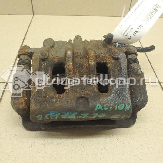 Фото Суппорт тормозной передний левый  4811034050 для ssang yong Actyon New/Korando C