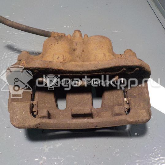 Фото Суппорт тормозной передний левый  4811034050 для ssang yong Actyon New/Korando C