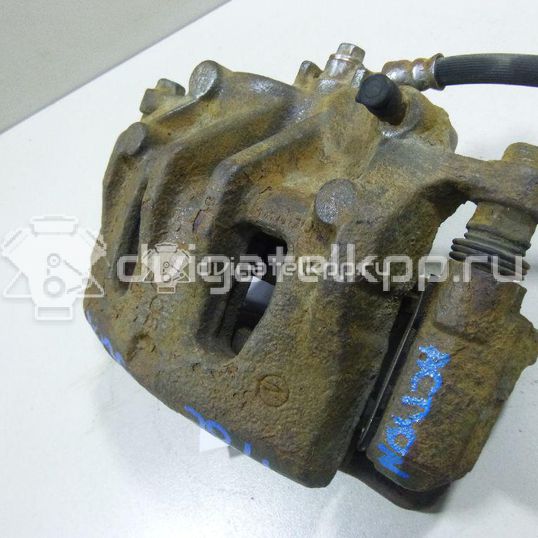 Фото Суппорт тормозной передний левый  4811034050 для ssang yong Actyon New/Korando C