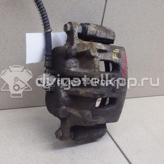 Фото Суппорт тормозной передний левый  4811034050 для ssang yong Actyon New/Korando C