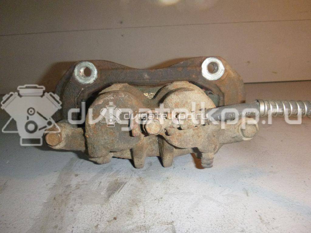 Фото Суппорт тормозной передний левый  4811034050 для ssang yong Actyon New/Korando C {forloop.counter}}