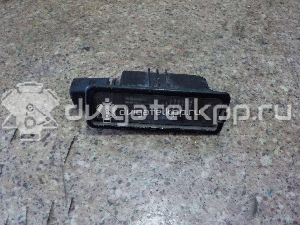 Фото Фонарь подсветки номера  1K8943021 для Volkswagen Scirocco / Polo / Touran / Amarok S1B / New Beetle {forloop.counter}}