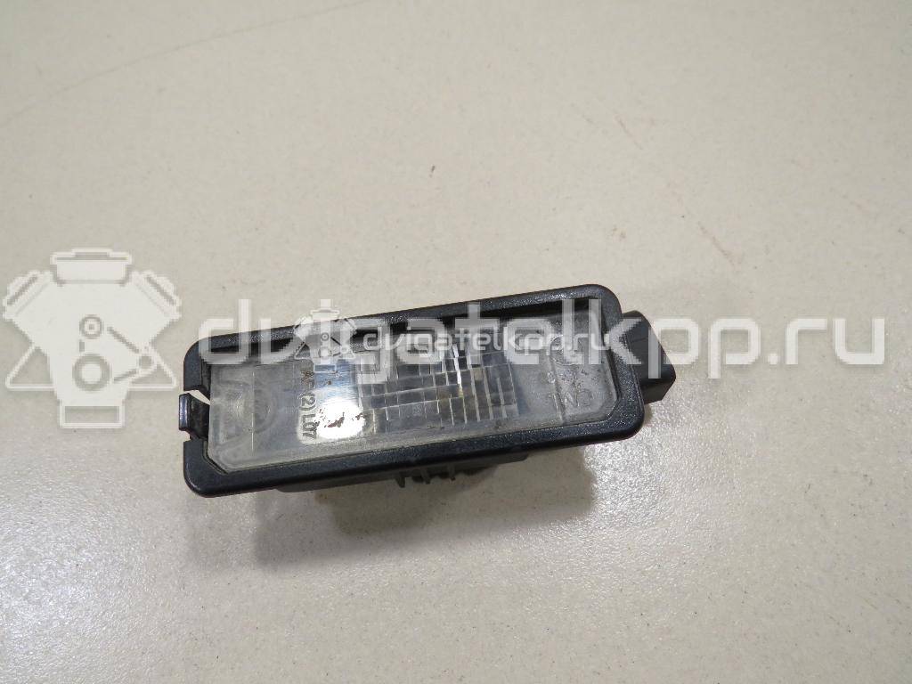 Фото Фонарь подсветки номера  1K8943021 для Volkswagen Scirocco / Polo / Touran / Amarok S1B / New Beetle {forloop.counter}}