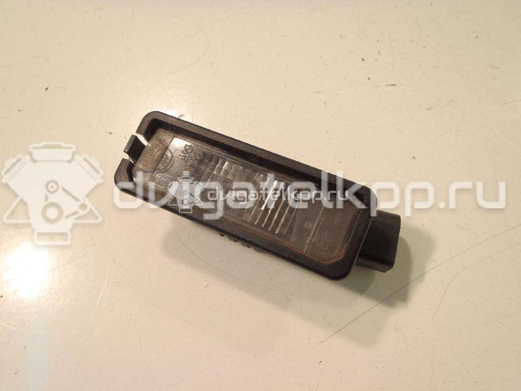 Фото Фонарь подсветки номера  1K8943021 для Volkswagen Scirocco / Polo / Touran / Amarok S1B / New Beetle {forloop.counter}}