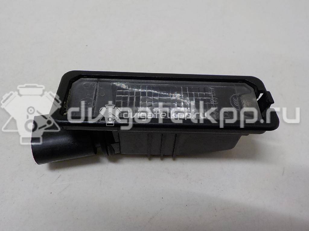 Фото Фонарь подсветки номера  1K8943021 для Volkswagen Scirocco / Polo / Touran / Amarok S1B / New Beetle {forloop.counter}}