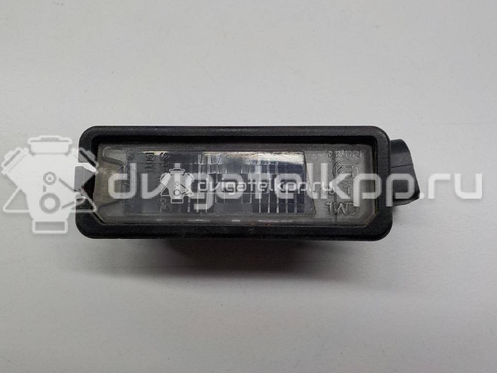 Фото Фонарь подсветки номера  1K8943021 для Volkswagen Scirocco / Polo / Touran / Amarok S1B / New Beetle {forloop.counter}}