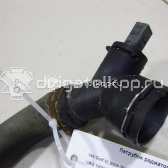 Фото Патрубок радиатора  1K0121086AJ для Volkswagen Touran / Caddy / Jetta / Golf