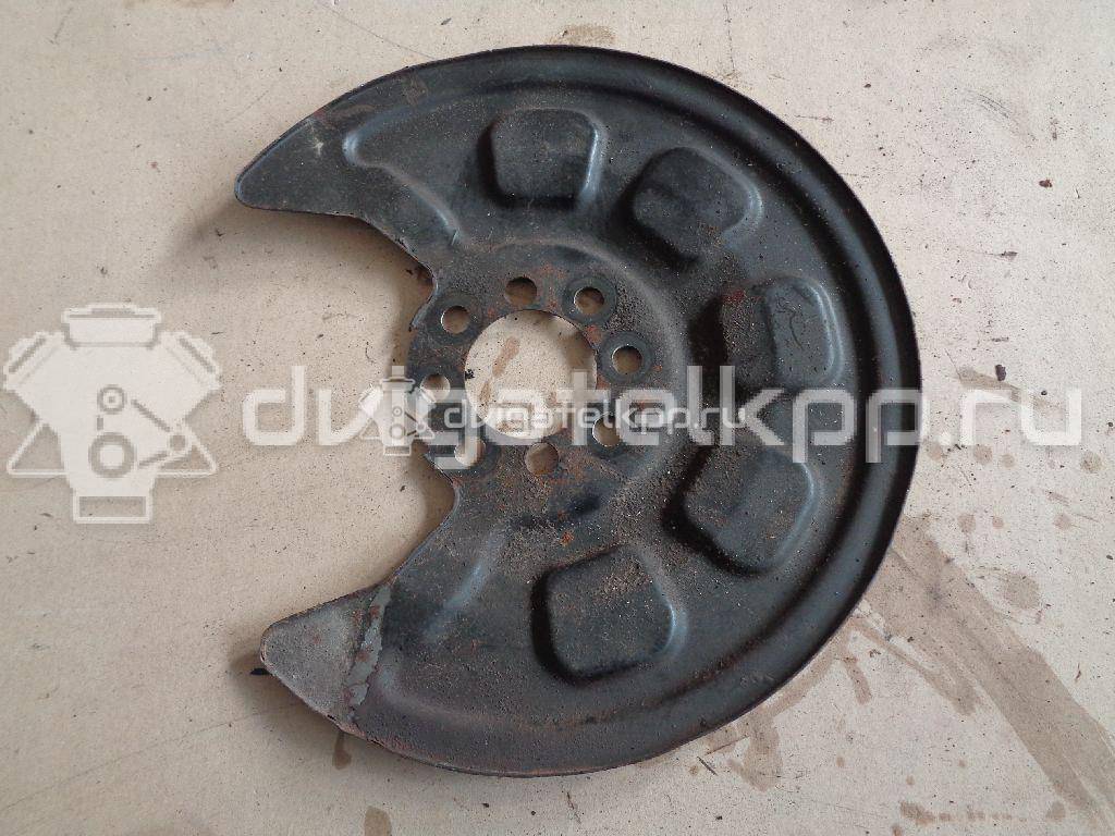 Фото Пыльник тормозного диска  2K0615609A для Volkswagen Caddy {forloop.counter}}