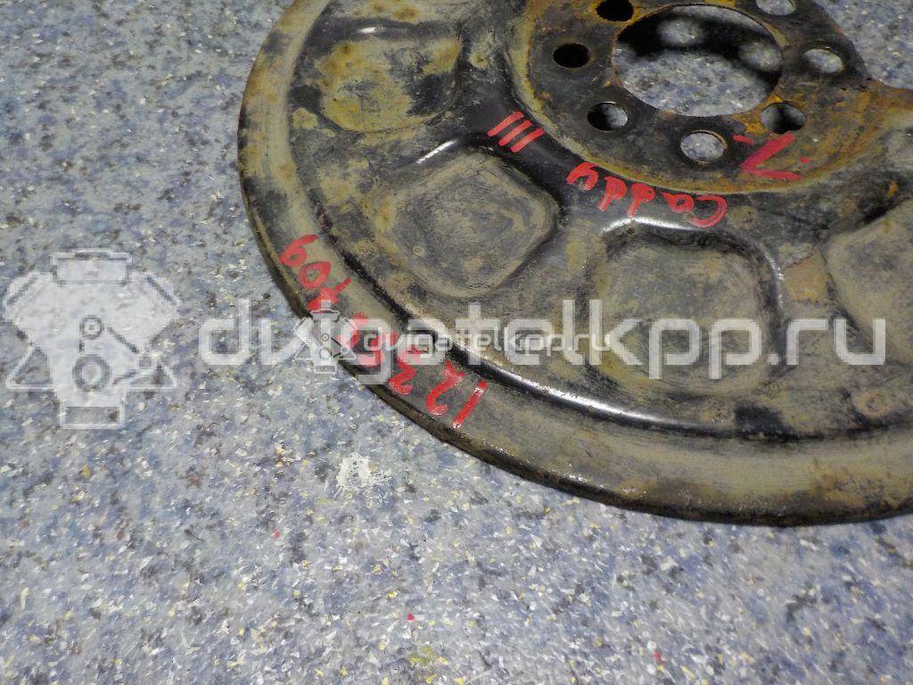 Фото Пыльник тормозного диска  2K0615609A для Volkswagen Caddy {forloop.counter}}
