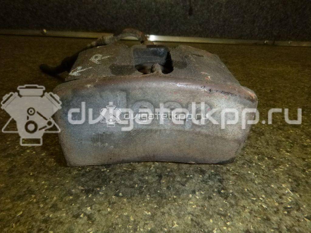 Фото Суппорт тормозной задний правый  5143702AA для Jeep Commander Xk, Xh / Grand Cherokee {forloop.counter}}