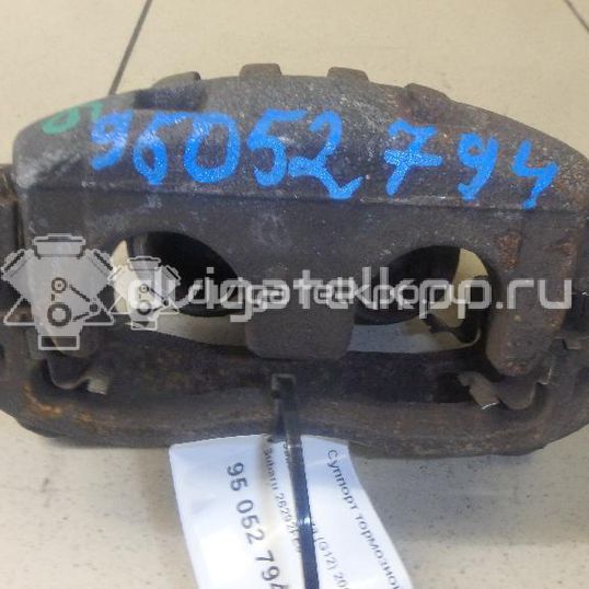 Фото Суппорт тормозной передний левый  26292FE011 для Subaru Legacy / Impreza / Outback / Forester / Xv