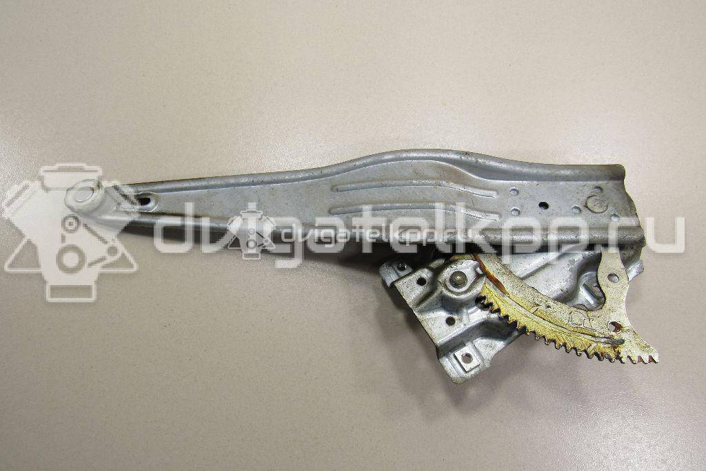 Фото Стеклоподъемник механ. задний правый  698300d010 для Toyota Yaris {forloop.counter}}