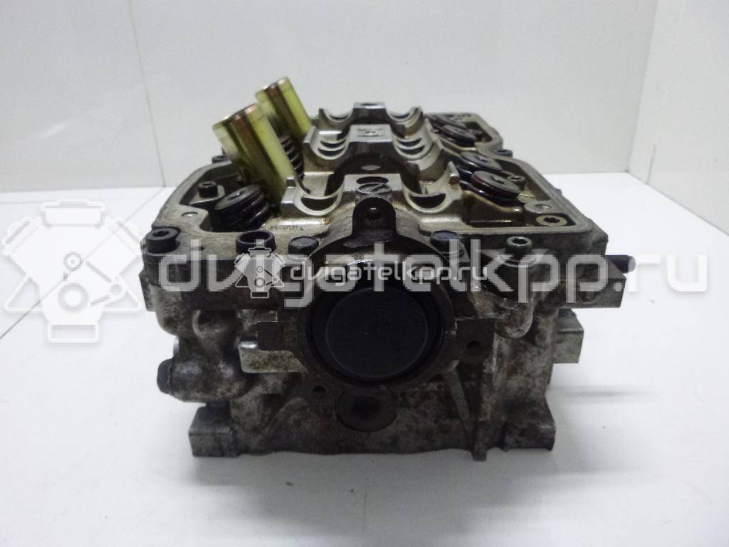 Фото Головка блока для двигателя EJ20 (Turbo) для Subaru Impreza 211-250 л.с 16V 2.0 л бензин 11039AB430 {forloop.counter}}