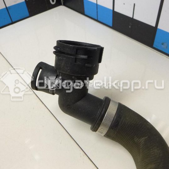 Фото Патрубок радиатора  5Q0121049AC для audi 100 [C4]