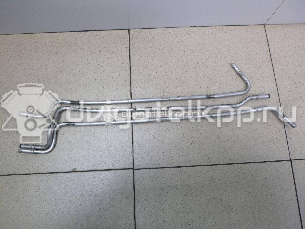 Фото Трубка топливная для двигателя BXE для Audi A3 105 л.с 8V 1.9 л Дизельное топливо 03G130308K {forloop.counter}}