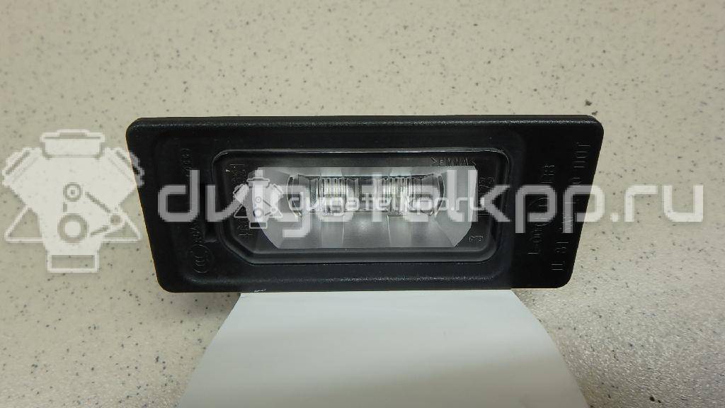 Фото Фонарь подсветки номера  4G0943021 для Audi A4 / A6 / A3 / A5 / Tt {forloop.counter}}