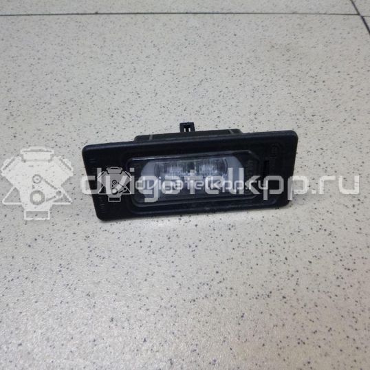 Фото Фонарь подсветки номера  4g0943021 для Audi A4 / A6 / A3 / A5 / Tt