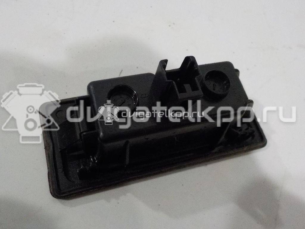 Фото Фонарь подсветки номера  4G0943021 для Audi A4 / A6 / A3 / A5 / Tt {forloop.counter}}