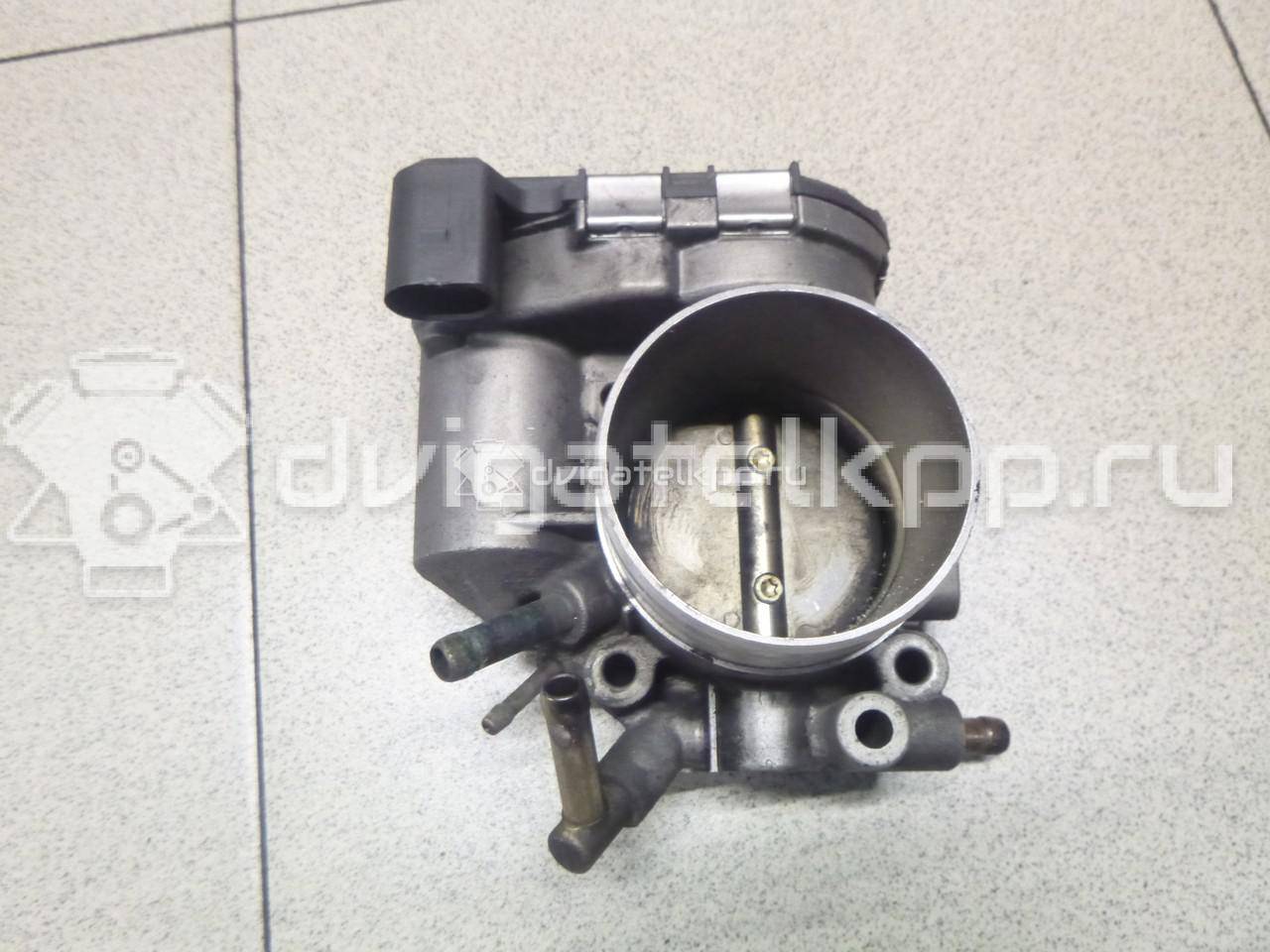 Фото Заслонка дроссельная электрическая  06B133062H для Audi A4 / A6 {forloop.counter}}