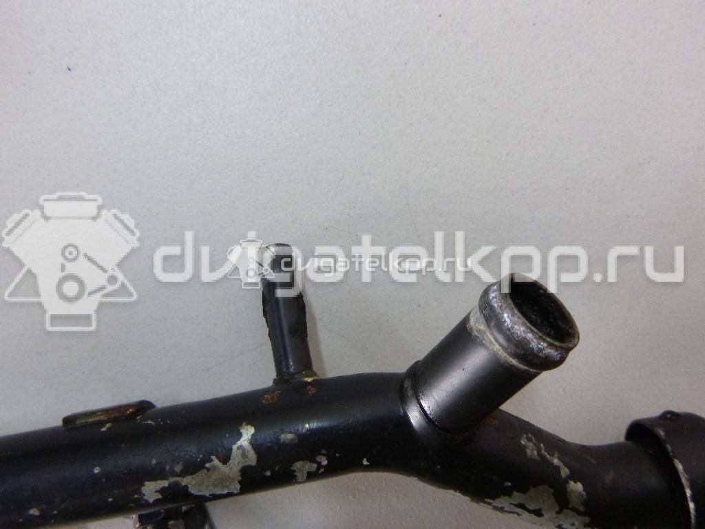 Фото Трубка охлажд. жидкости металлическая  06B121065AA для Audi A4 {forloop.counter}}