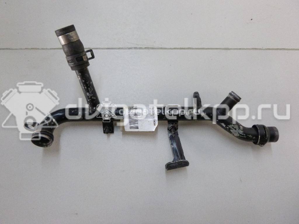 Фото Трубка охлажд. жидкости металлическая  06B121065AA для Audi A4 {forloop.counter}}