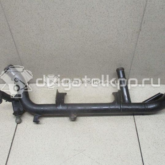 Фото Трубка охлажд. жидкости металлическая  06B121065AA для Audi A4