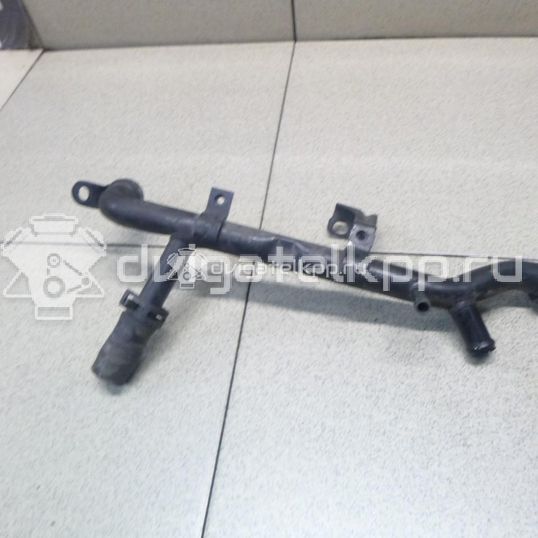 Фото Трубка охлажд. жидкости металлическая  06B121065AA для Audi A4