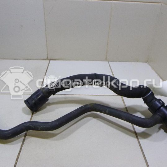 Фото Патрубок радиатора  8e0121049l для Audi A4