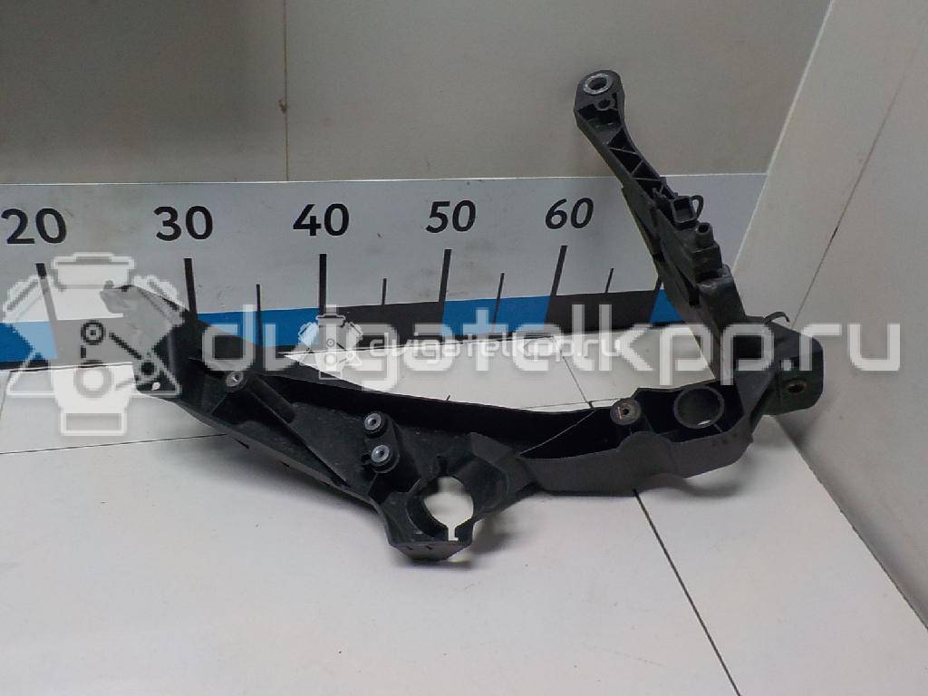 Фото Кронштейн фар левый  8K0805607A для Audi A4 {forloop.counter}}