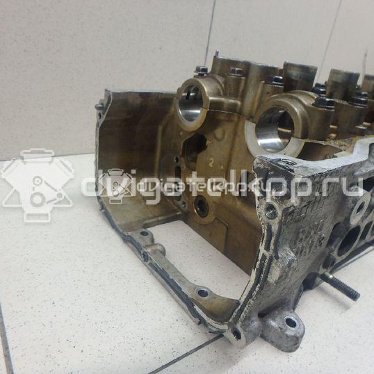 Фото Головка блока для двигателя CR14DE для Nissan Note / Micra 88-98 л.с 16V 1.4 л бензин 11040BX000