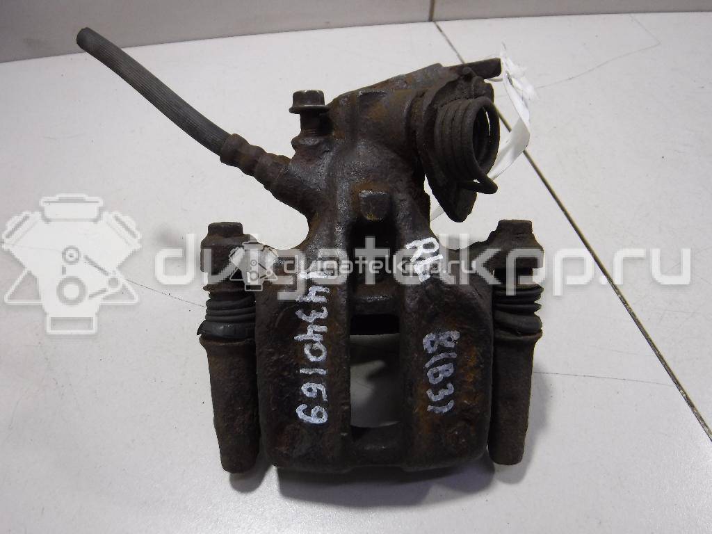 Фото Суппорт тормозной задний левый  853615424AX для Audi A6 / 100 / 80 / 200 / 90 {forloop.counter}}