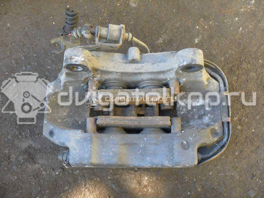 Фото Суппорт тормозной задний левый  7L6615423L для Audi Q7 {forloop.counter}}