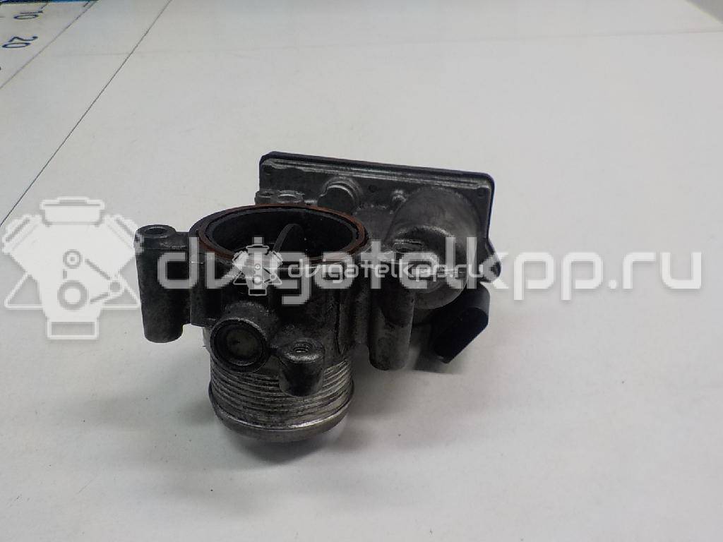 Фото Заслонка дроссельная электрическая  03L128063R для Audi A4 / A6 / A3 / A5 / Tt {forloop.counter}}