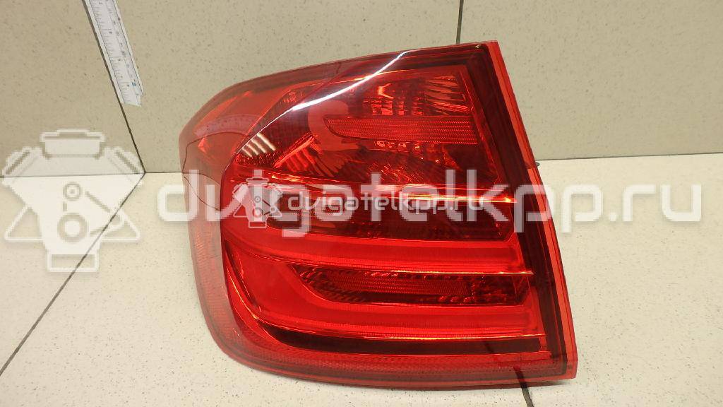 Фото Фонарь задний наружный левый  63217313039 для Bmw 3 {forloop.counter}}