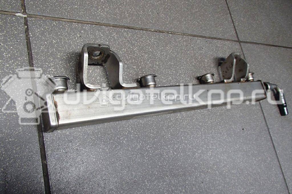 Фото Рейка топливная (рампа) для двигателя BP (DOHC) для Mazda / Ford Australia / Eunos 103-125 л.с 16V 1.8 л бензин 1438753 {forloop.counter}}