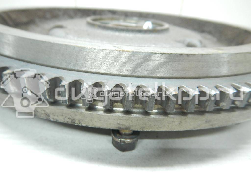 Фото Маховик для двигателя G4EE для Hyundai (Beijing) / Kia 95 л.с 16V 1.4 л бензин 2320026101 {forloop.counter}}