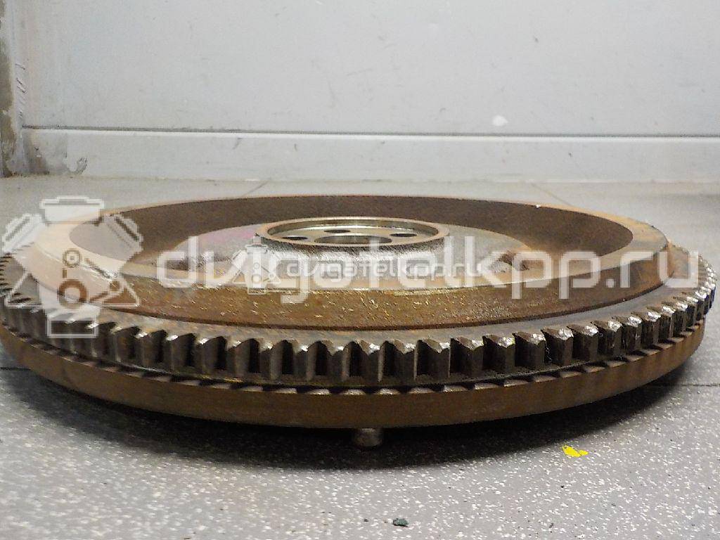 Фото Маховик для двигателя G4EE для Hyundai (Beijing) / Kia 95 л.с 16V 1.4 л бензин 2320026101 {forloop.counter}}