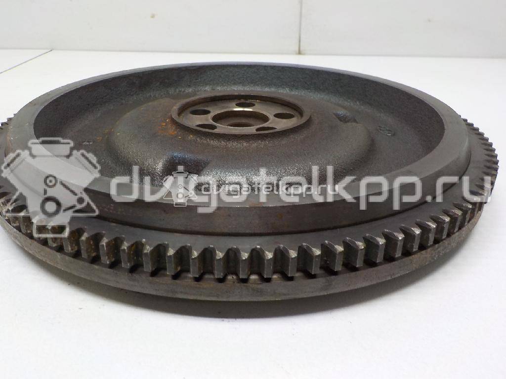 Фото Маховик для двигателя G4ED для Hyundai (Beijing) / Hyundai / Kia 105-112 л.с 16V 1.6 л бензин 2320026101 {forloop.counter}}