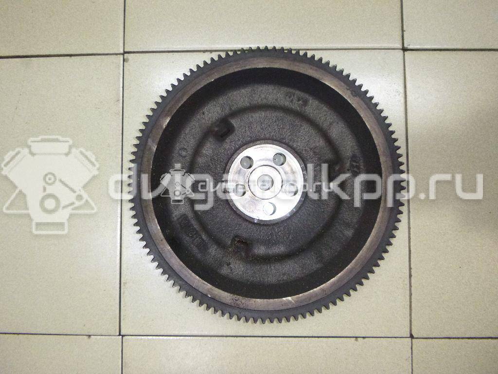 Фото Маховик для двигателя G4EE для Hyundai (Beijing) / Kia 95 л.с 16V 1.4 л бензин 2320026101 {forloop.counter}}