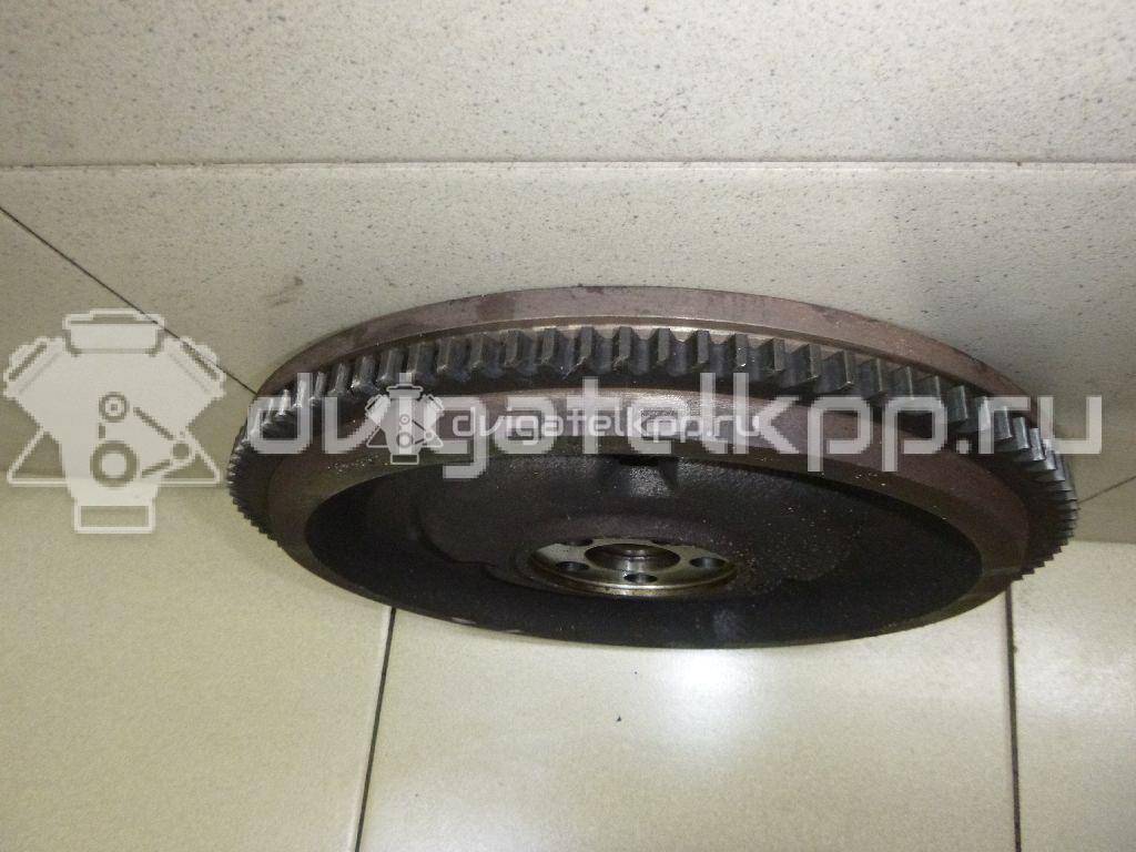 Фото Маховик для двигателя G4EE для Hyundai (Beijing) / Kia 95 л.с 16V 1.4 л бензин 2320026101 {forloop.counter}}