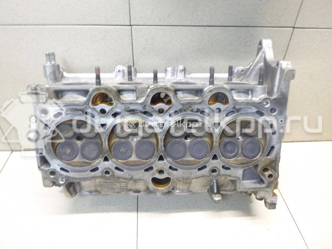Фото Головка блока для двигателя G4FA для Hyundai (Beijing) / Hyundai / Kia 101-109 л.с 16V 1.4 л бензин 221002B001 {forloop.counter}}